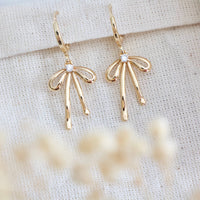 CZ Bow Huggie Earrings